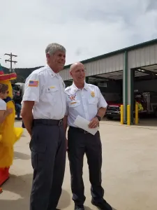 Photo of two men talking