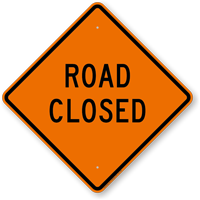May contain: symbol, road sign, and sign