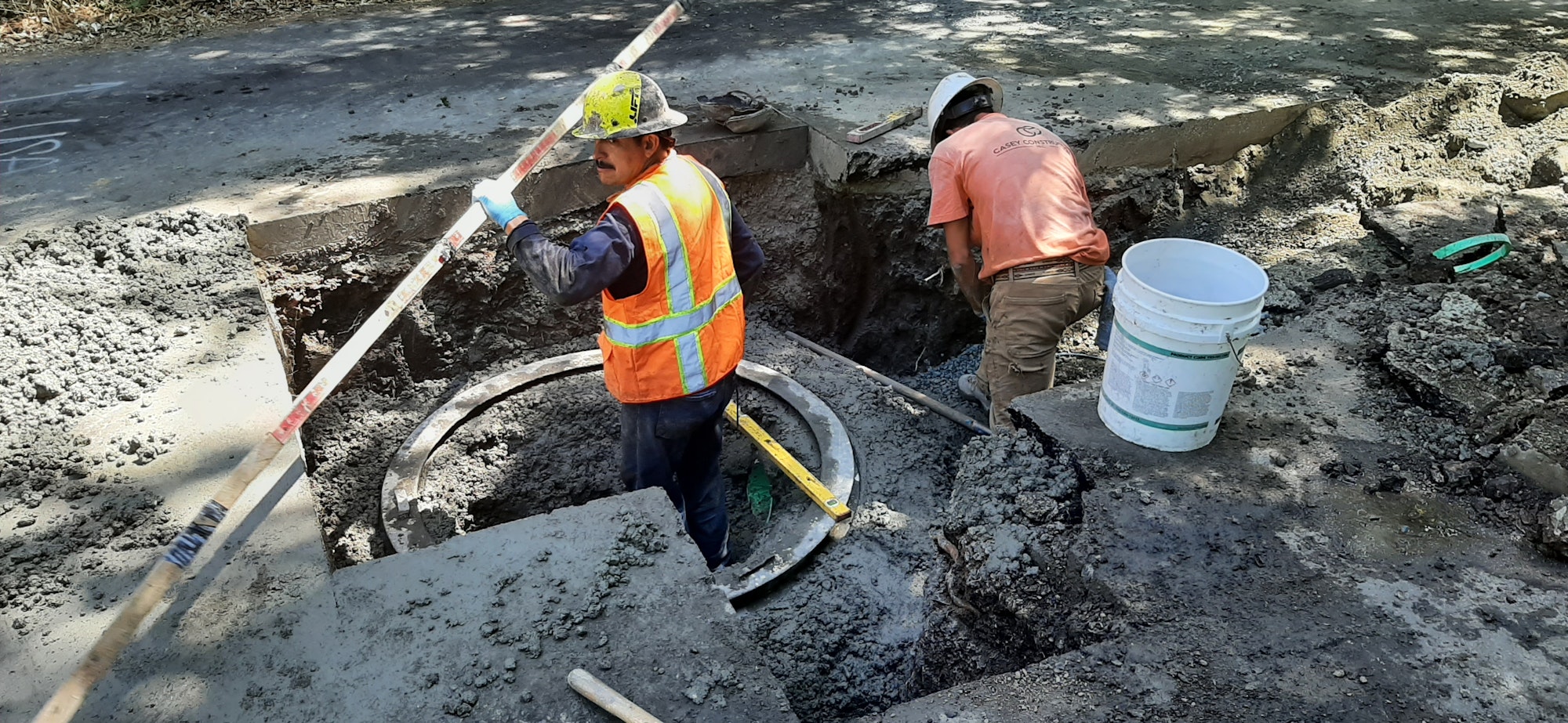 May contain: person, worker, adult, male, man, clothing, hardhat, helmet, and construction