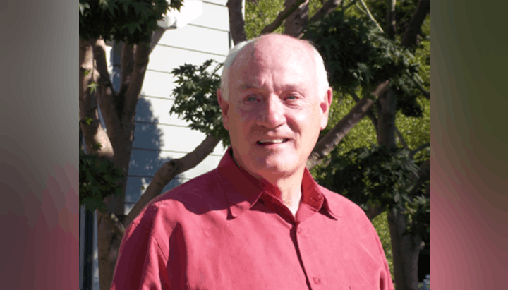 May contain: face, head, person, photography, portrait, plant, tree, clothing, shirt, adult, male, and man