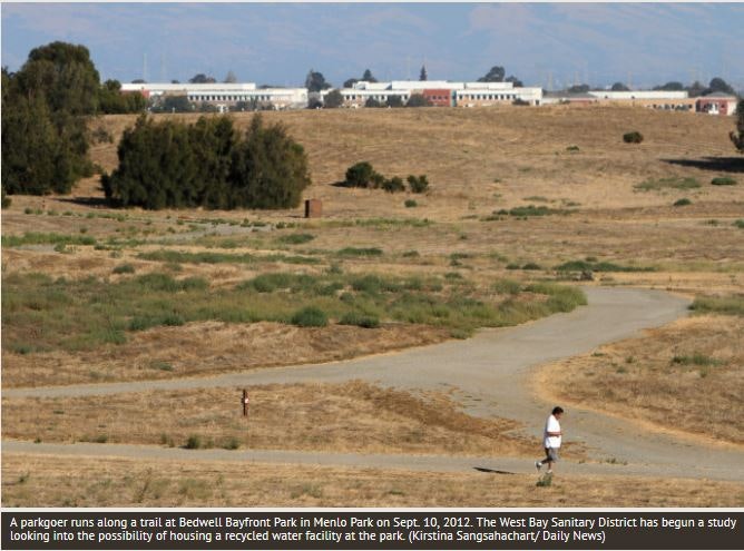 May contain: person, walking, land, nature, outdoors, field, grassland, soil, airport, road, airfield, plant, and tree