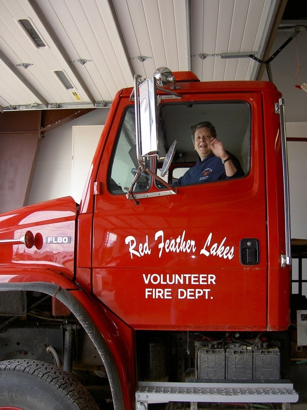 May contain: truck, vehicle, transportation, person, human, and fire truck