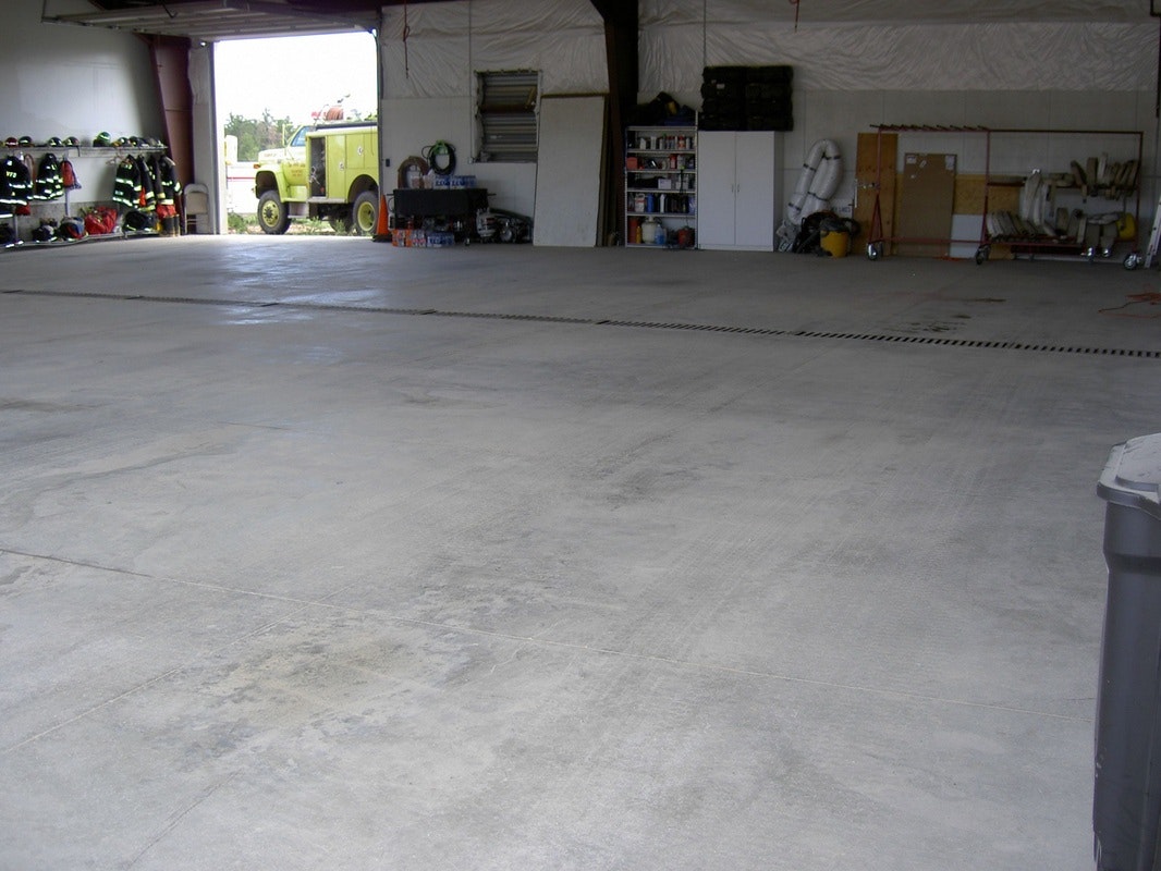 May contain: floor, flooring, and concrete