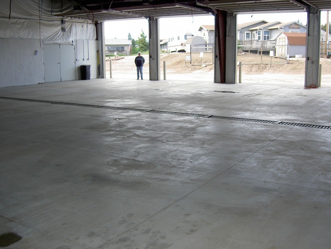 May contain: flooring, person, human, floor, and concrete