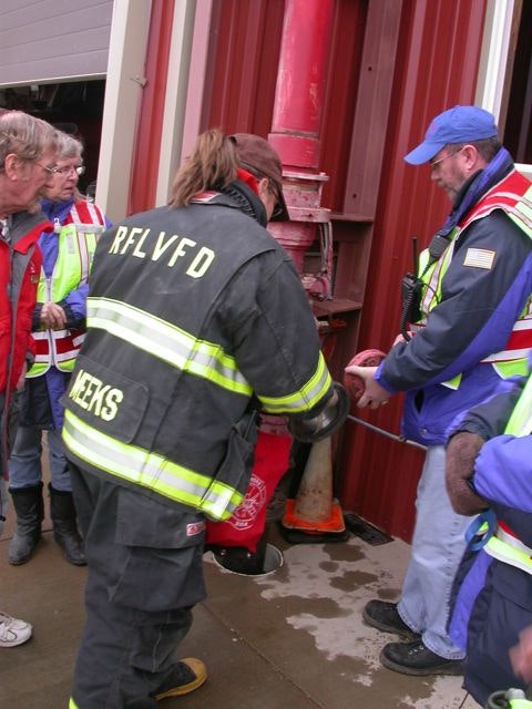 May contain: person, human, shoe, clothing, footwear, apparel, and fireman