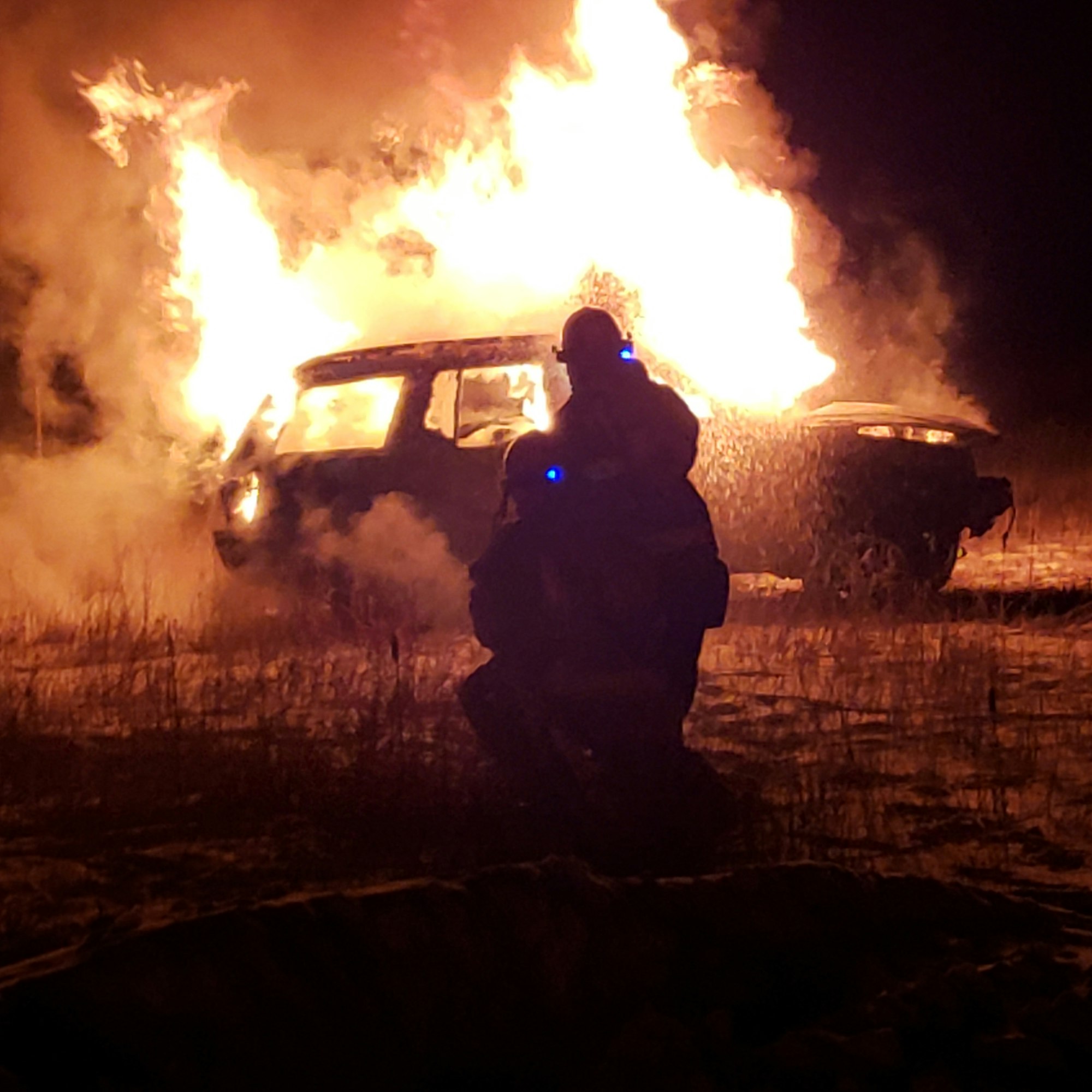 May contain: flame, fire, and person