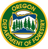 Oregon Department of Forestry emblem with mountains, trees, and a river.