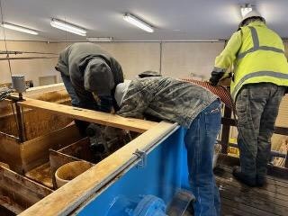 Contractors removing media