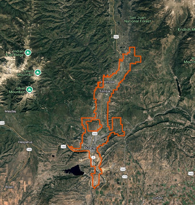 A satellite map featuring Durango with an orange boundary and nearby terrain details.