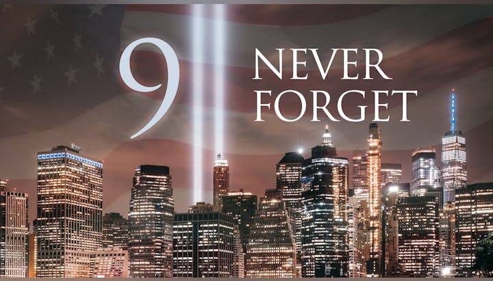City skyline with two light beams, an American flag overlay, and text saying "9 NEVER FORGET".