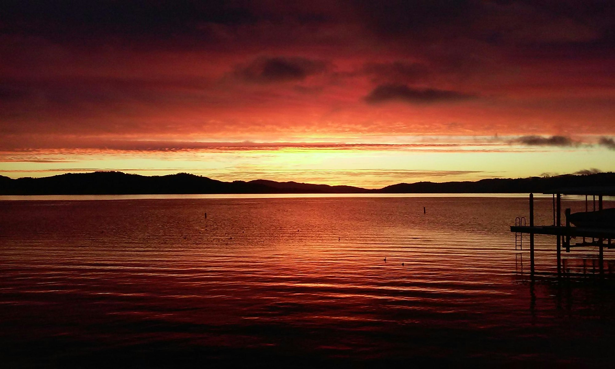 Red, orange and yellow sunrise over Clearlake