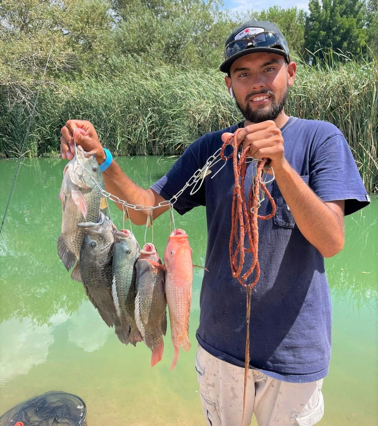 May contain: person, human, water, fish, animal, and outdoors