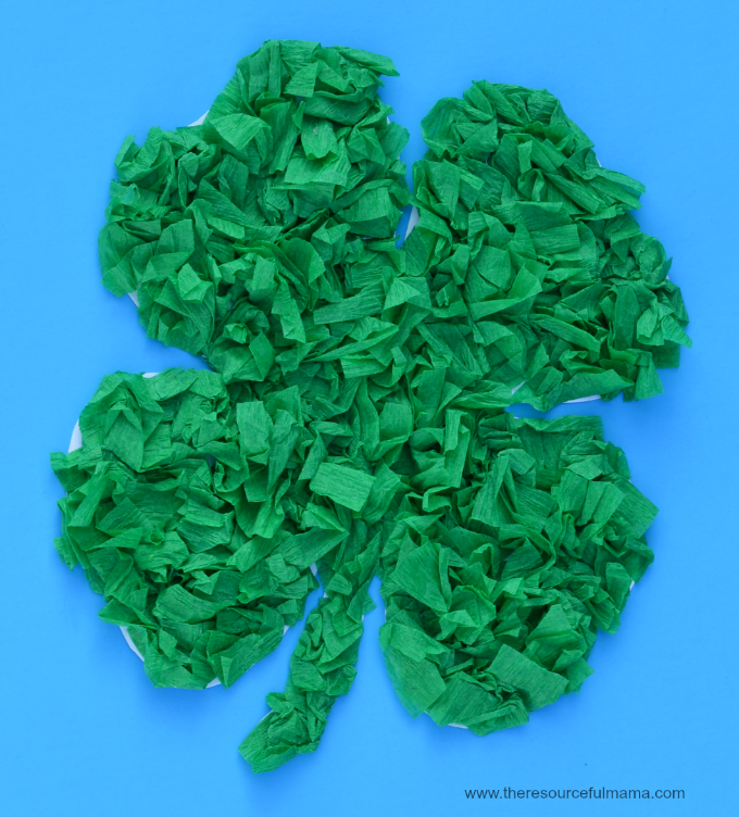 Paper four leaf clover covered with green crepe paper
