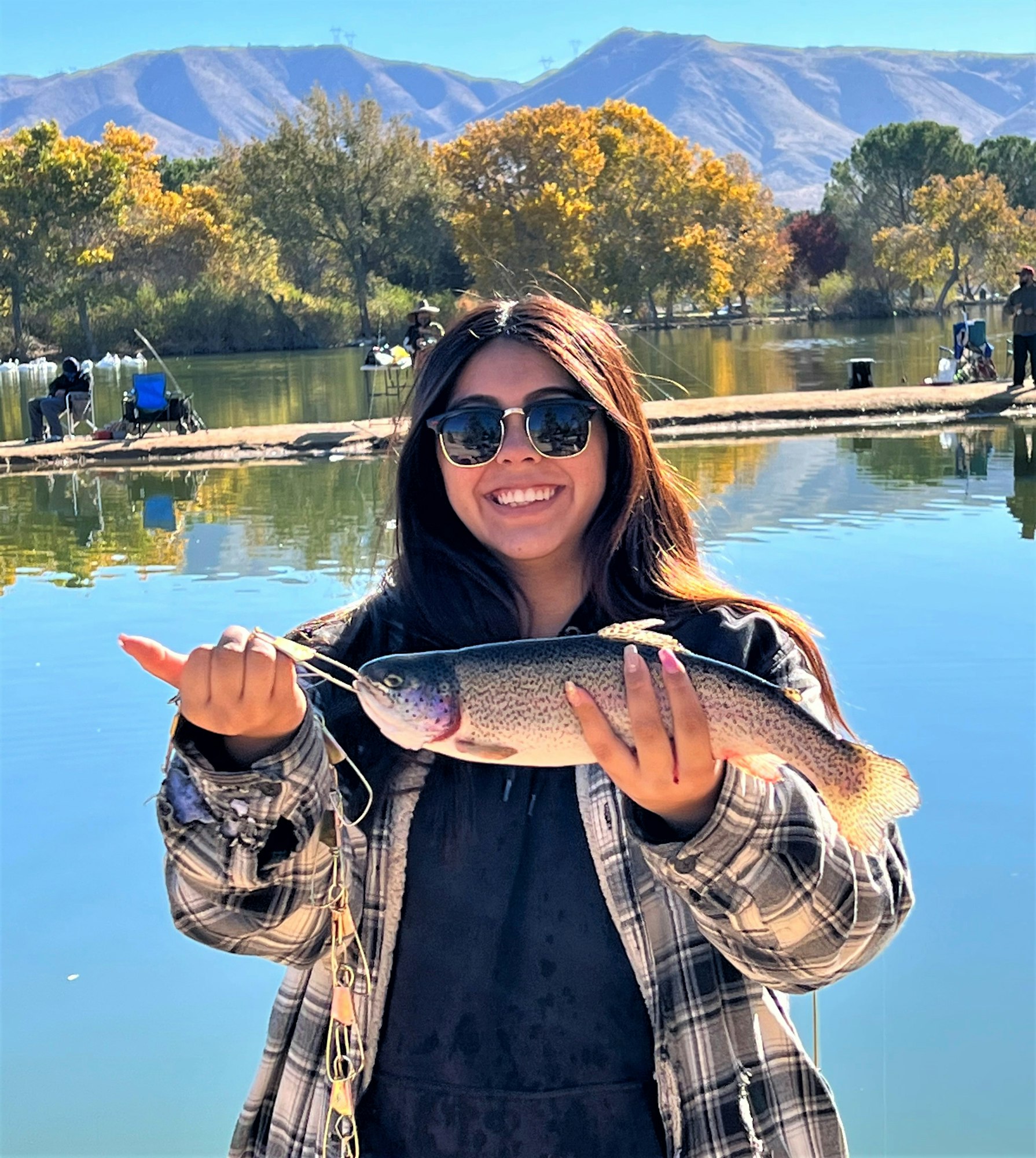 May contain: photography, sunglasses, accessories, fish, sea life, animal, portrait, person, head, face, outdoors, scenery, nature, water, smile, and happy