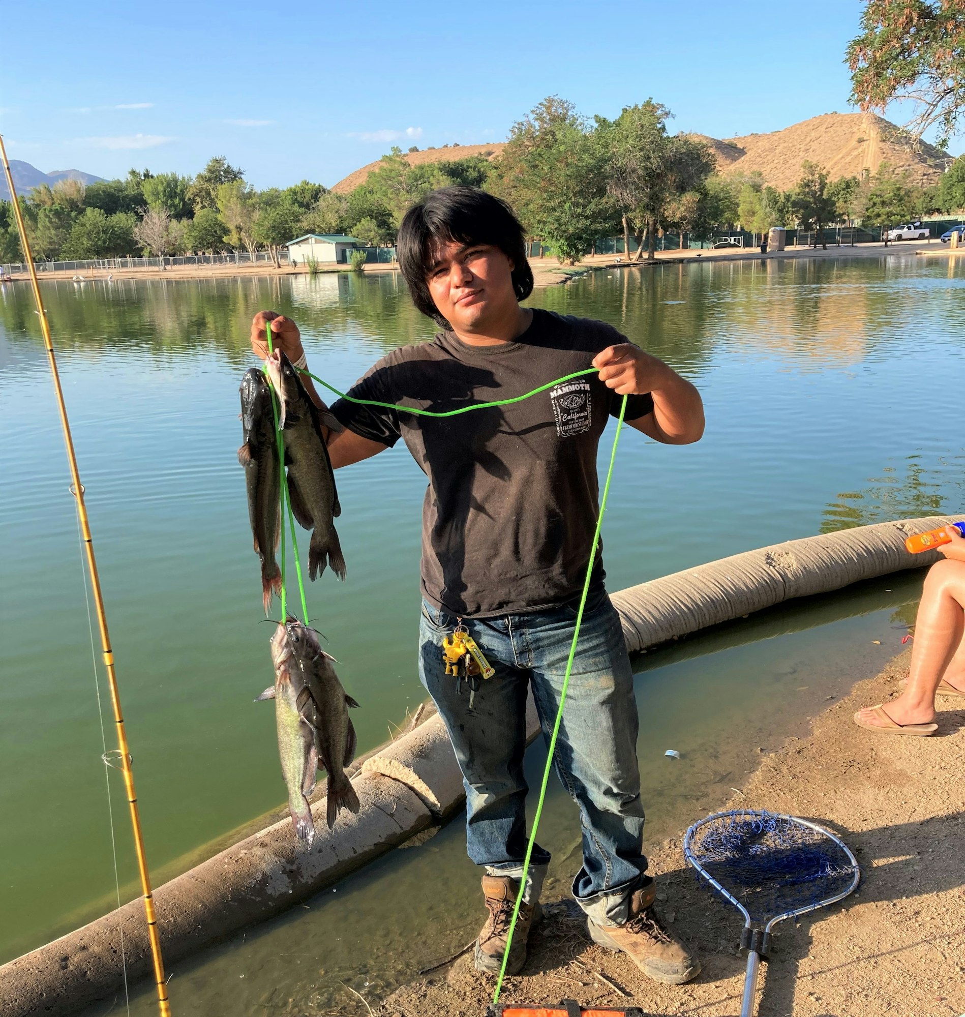 May contain: water, outdoors, person, human, and fishing