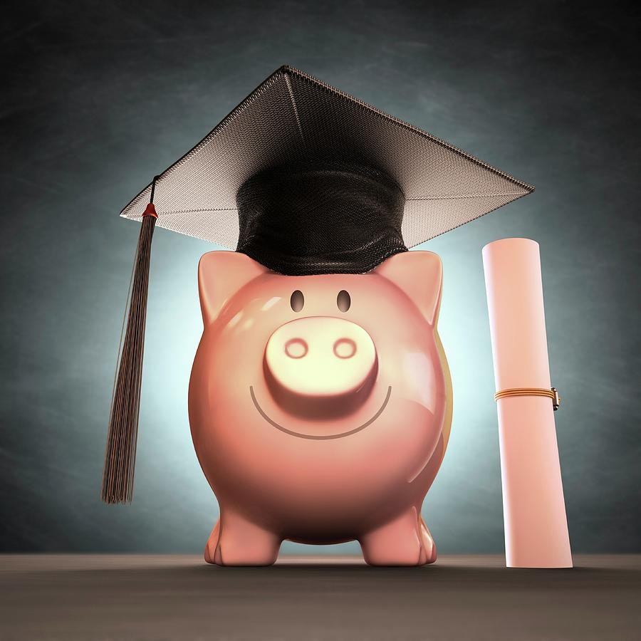 Piggy bank with a graduation cap and diploma