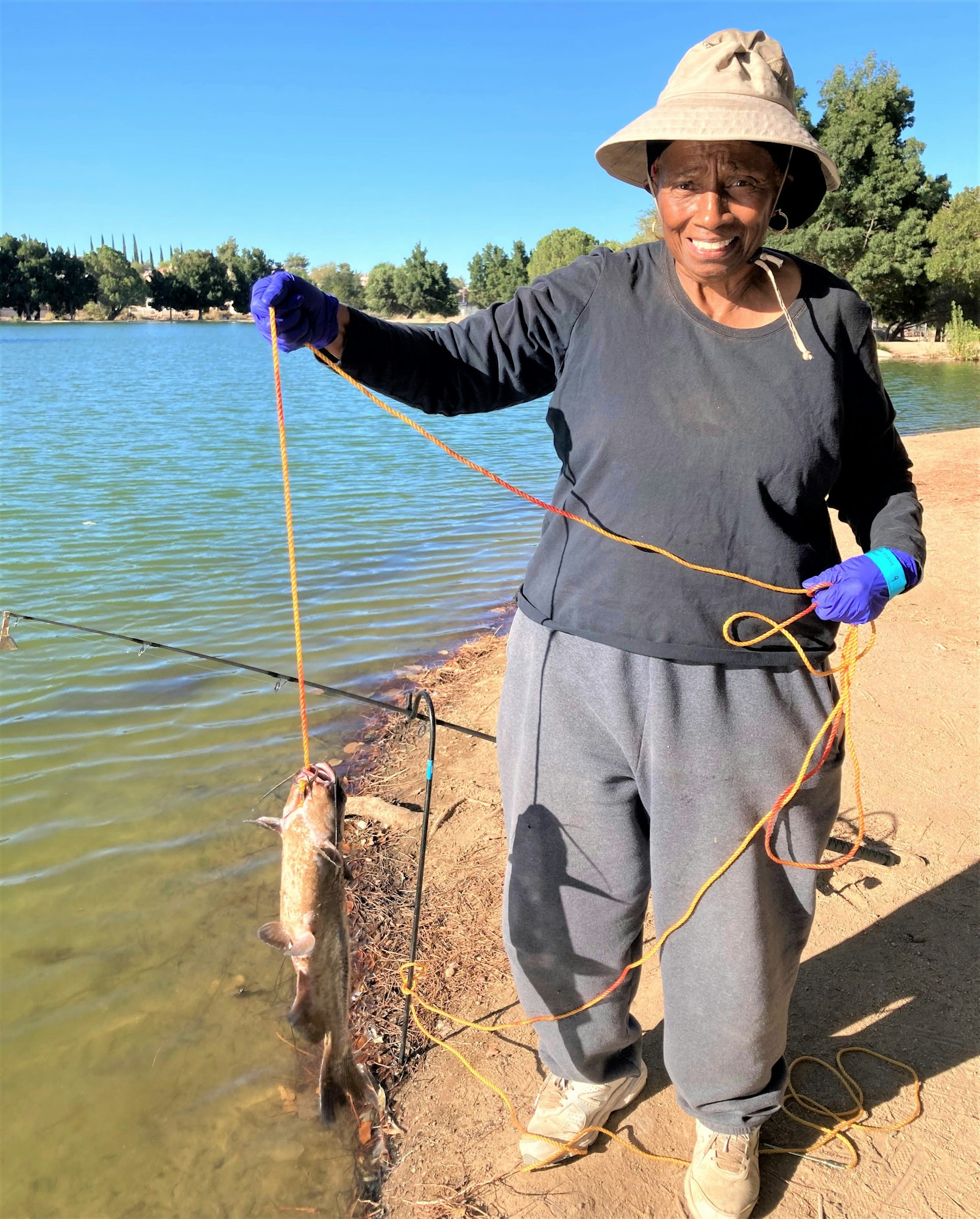 May contain: water, outdoors, person, human, fishing, clothing, and apparel