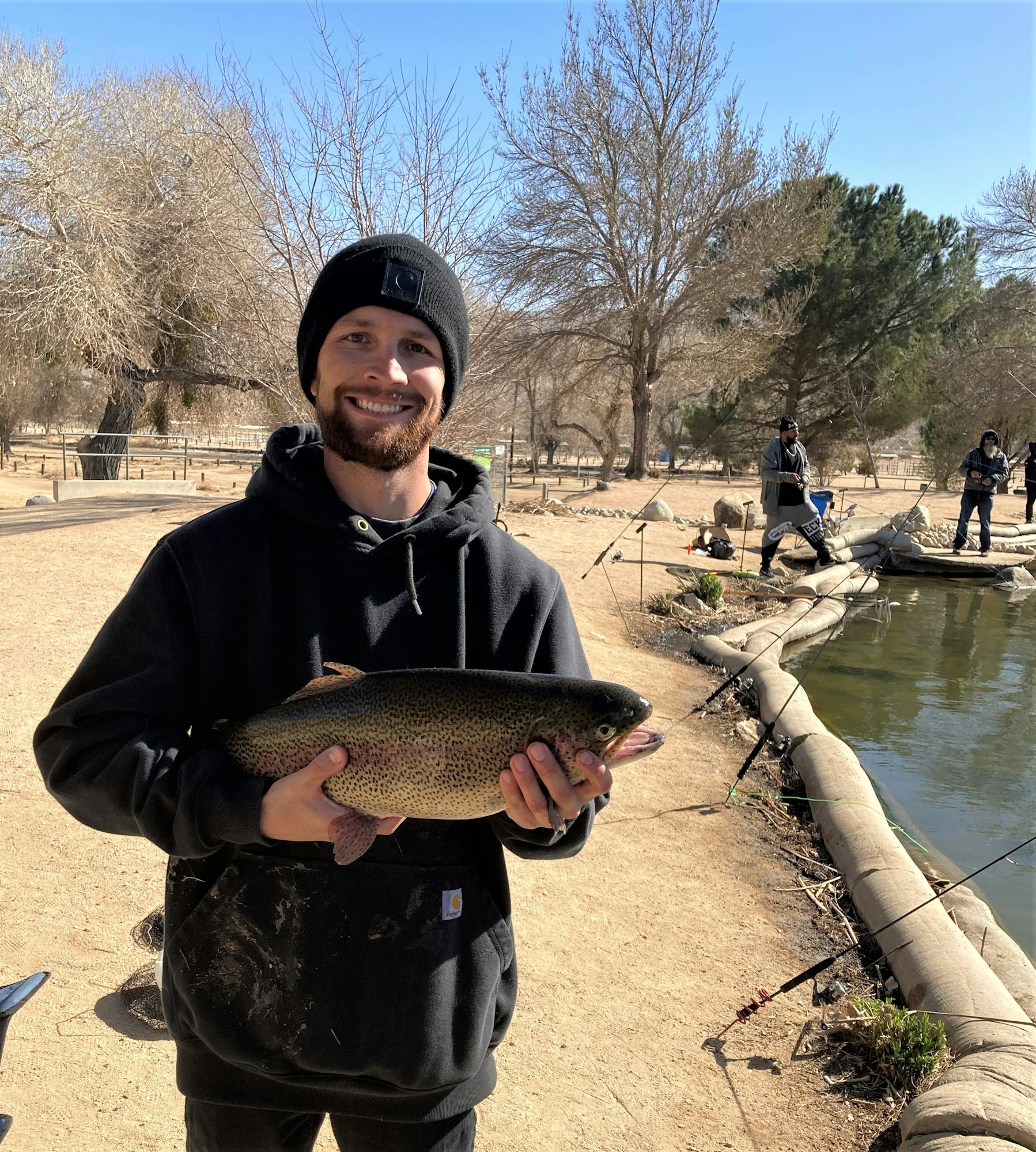 May contain: person, human, trout, animal, fish, coho, and water