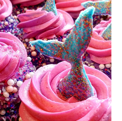May contain: sweets, confectionery, food, icing, creme, cake, cream, dessert, and cupcake