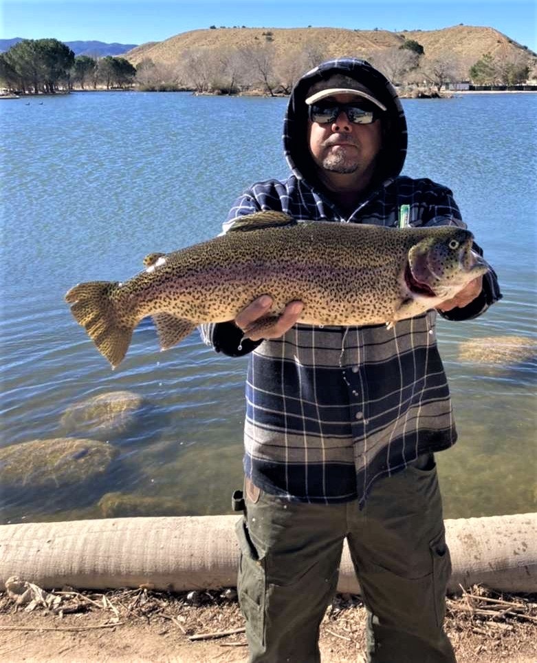 May contain: person, human, fish, animal, trout, sunglasses, accessories, and accessory