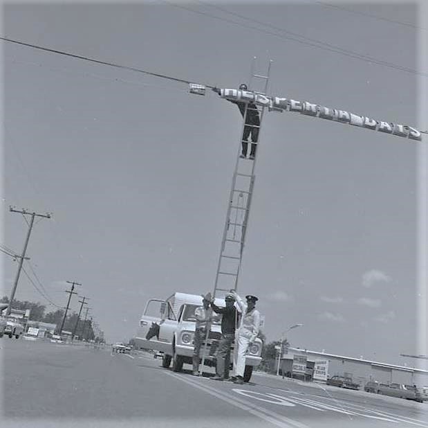May contain: construction crane, person, and human