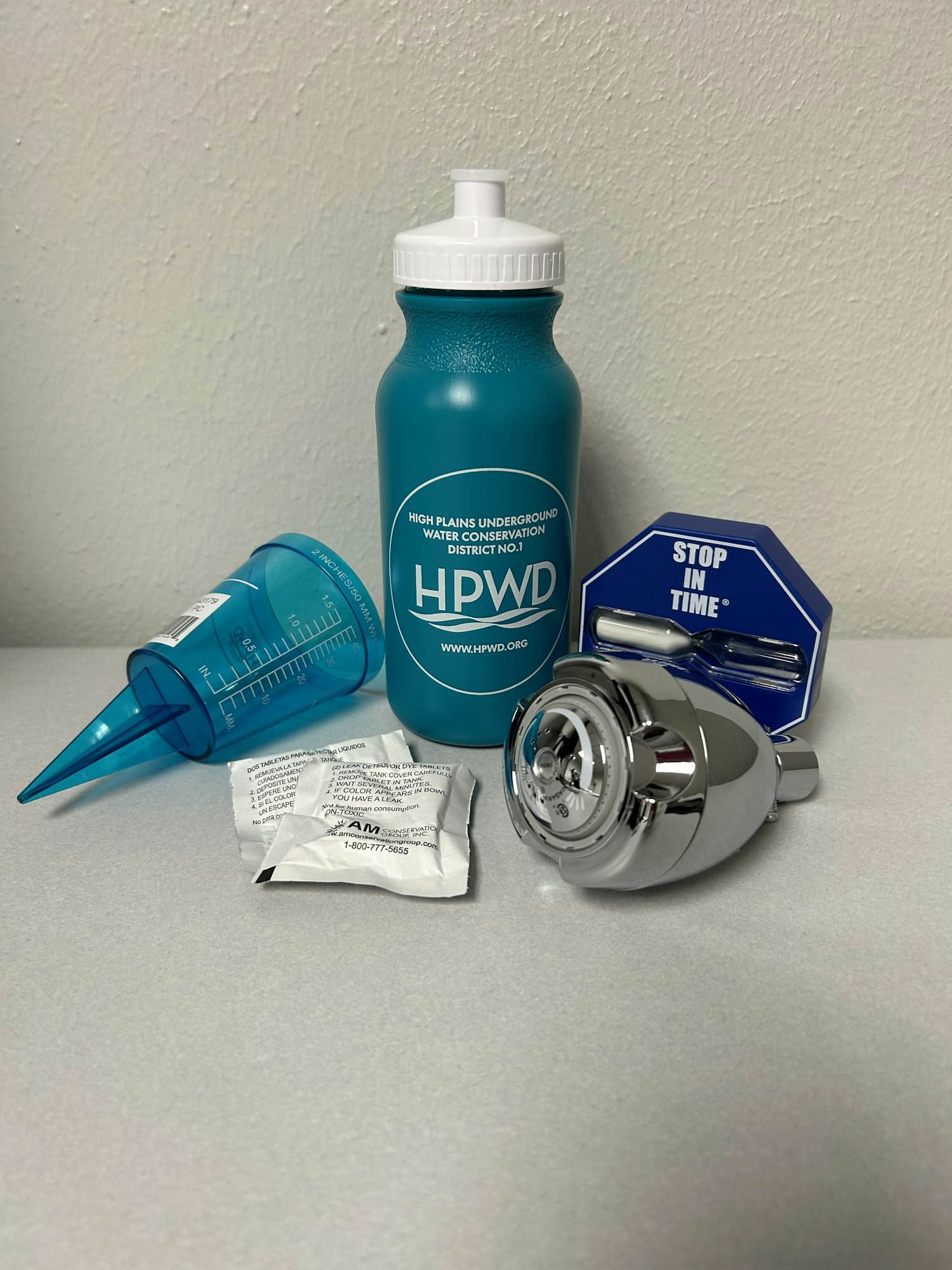 Conservation Kit includes: Low Flow Shower Head – Replacing your regular shower head with this low flow design can reduce your usage. Rain/Sprinkler Gauge – Measure the water that goes on you yard to make sure it received the proper amount. Water Bottle - Refillable water bottles will cut down on the number of glasses to wash. Keep your water bottle in the refrigerator to keep it cold. Leak Detector Tablets - Drop one in the toilet tank. If the dye shows up in the bowl, you’ve got a silent leak that needs repaired. Shower Timer - Take a 5 minute shower. Be aware of your water use!