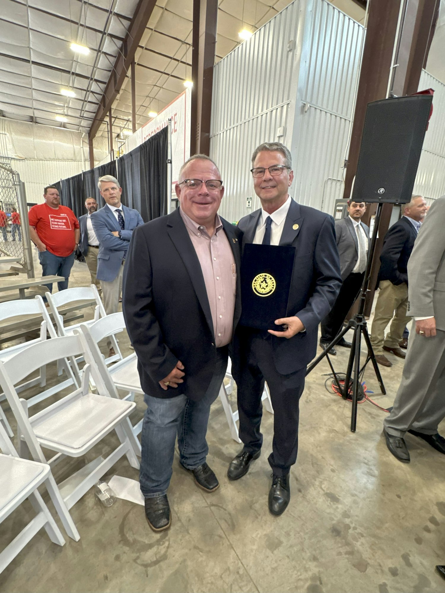 HPWD Precinct 2 Board Director, Brad Heffington and Senator Charles Perry at ceremony signing held at SIMFLO's Engineering Products Facility.