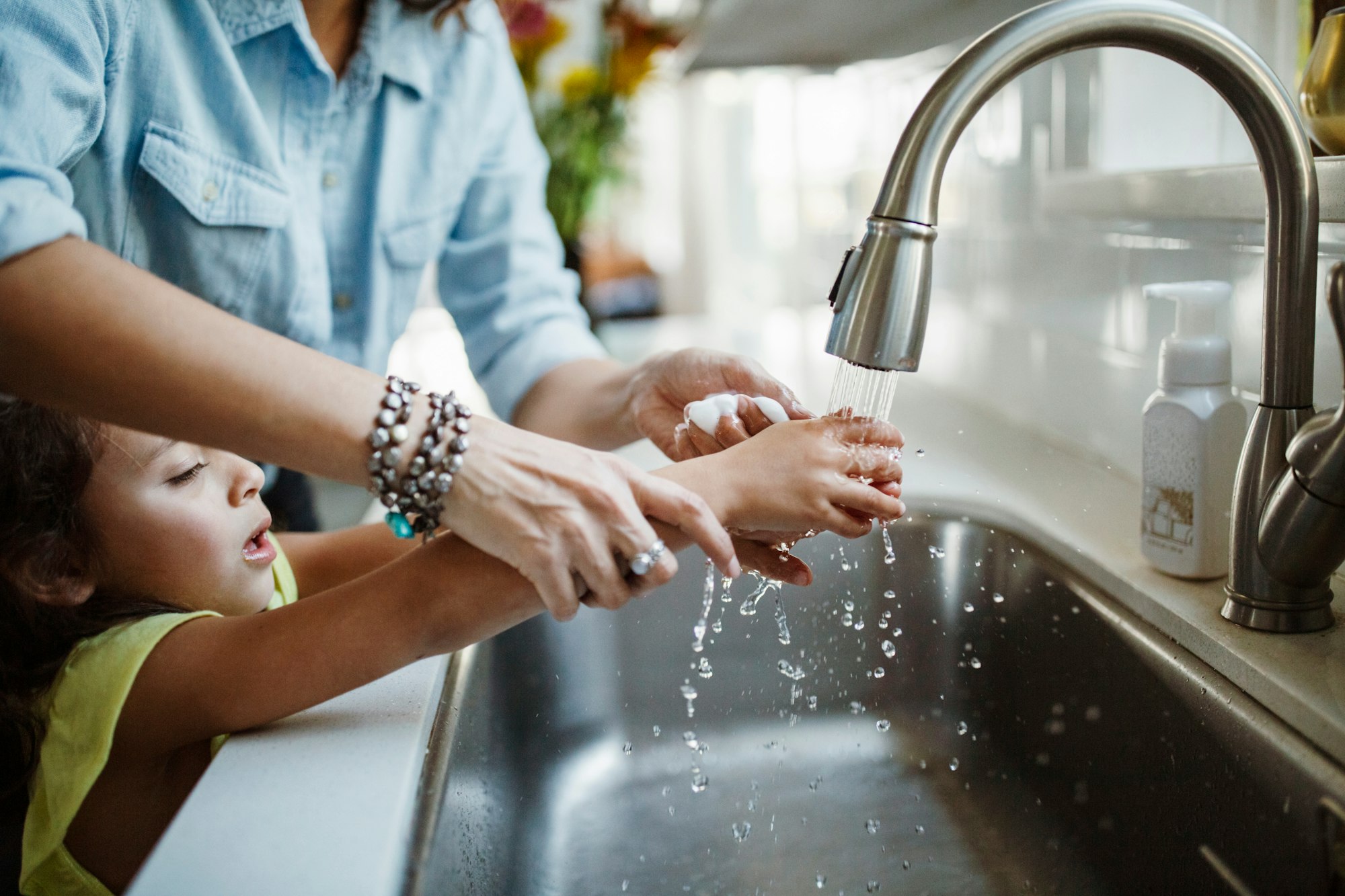 May contain: body part, hand, person, sink, and washing hands