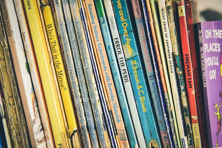 May contain: book, publication, indoors, library, shelf, and furniture