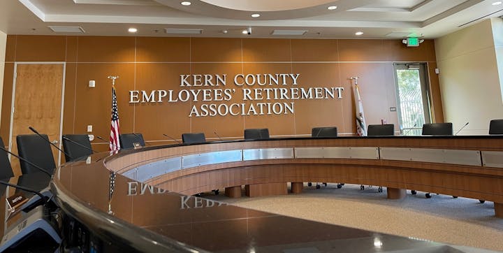 May contain: furniture, table, reception, indoors, room, reception desk, and lobby