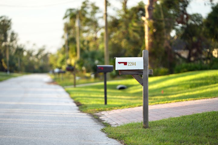 Picture of a row of residential Mailboxes along the road.