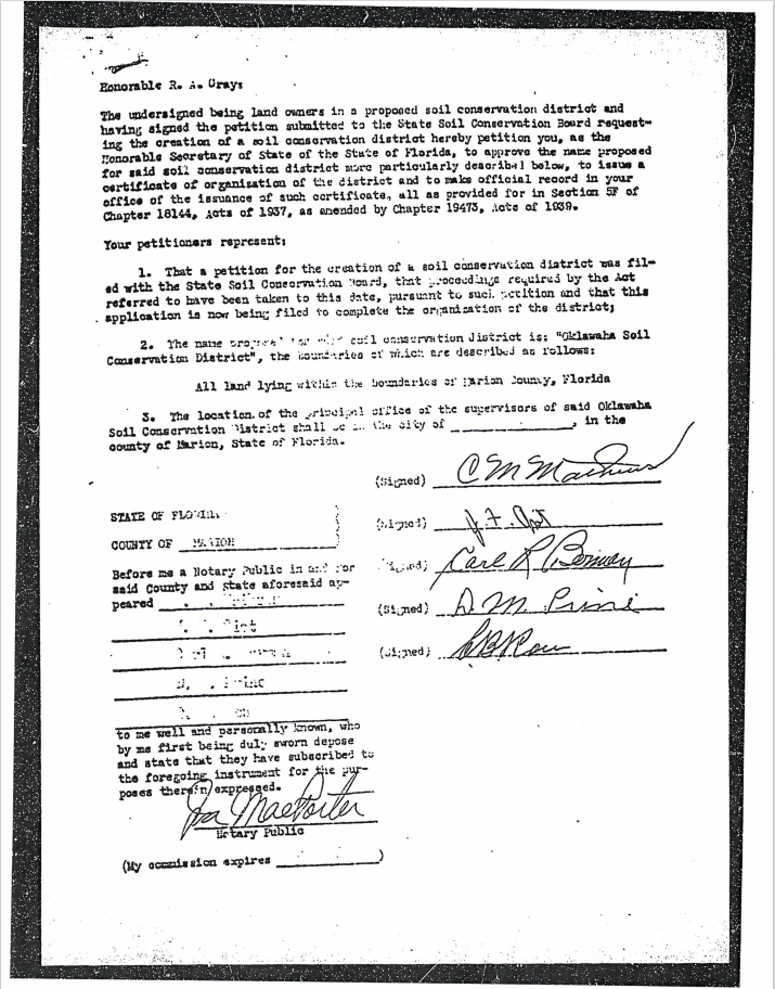 A petition for creating the Oklawaha Soil Conservation District in Marion County, Florida, with signatures and notarization.