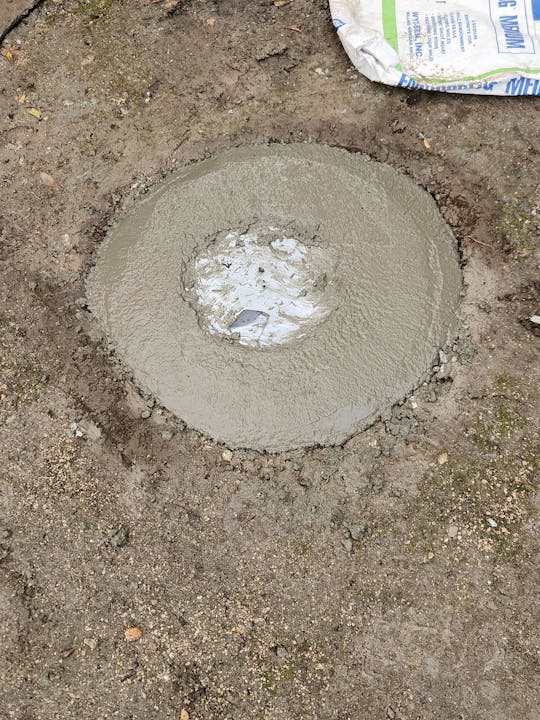 May contain: construction, water, soil, and mud