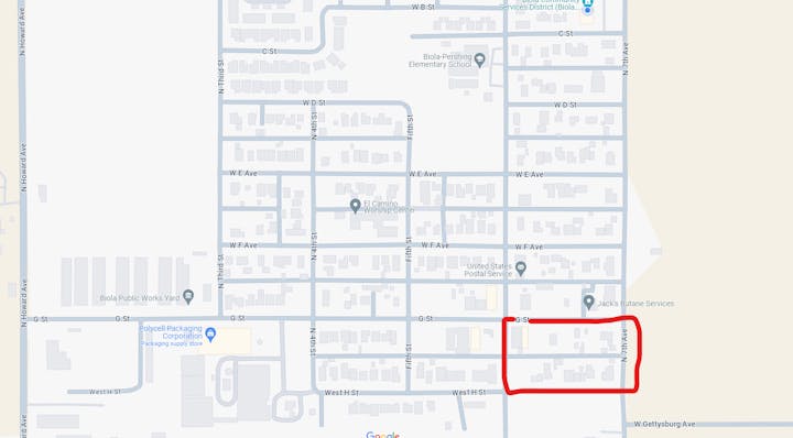 A map showing a section outlined in red, probably indicating a specific area of interest within a residential or mixed urban neighborhood.