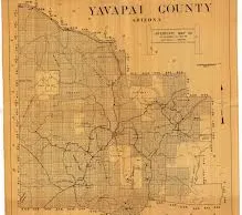 A vintage map of Yavapai County, Arizona, showing roads, towns, and geographic features with a marked grid layout.