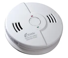 Smoke and carbon monoxide detector with test button, vents, and indicator lights.