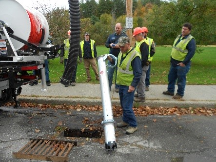 May contain: person, worker, clothing, footwear, shoe, helmet, adult, female, woman, male, man, hardhat, hat, and glove