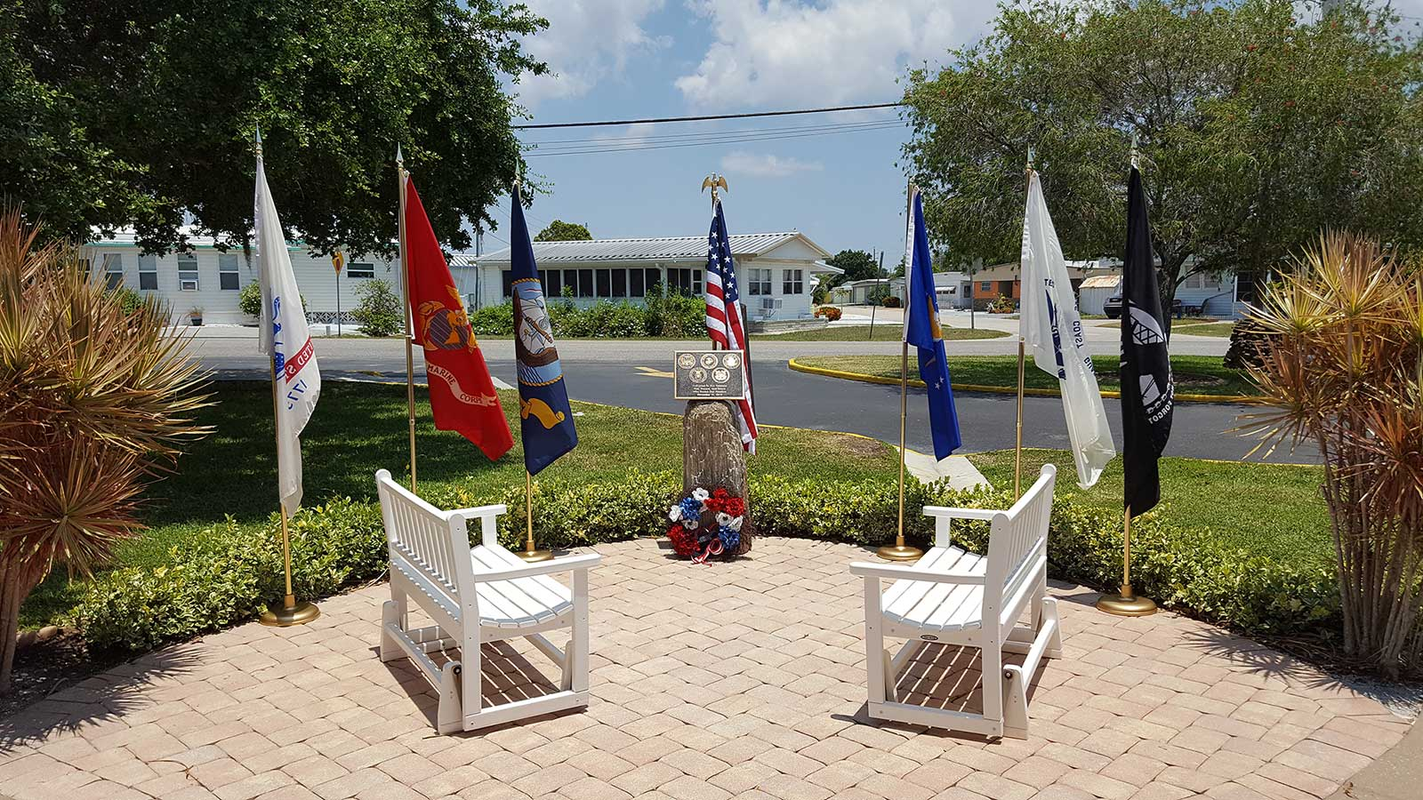Picture of the Veterans Memorial including the glider benches