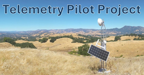 Remote hilltop with a telemetry setup, featuring solar panels and antenna. Text: "Telemetry Pilot Project."