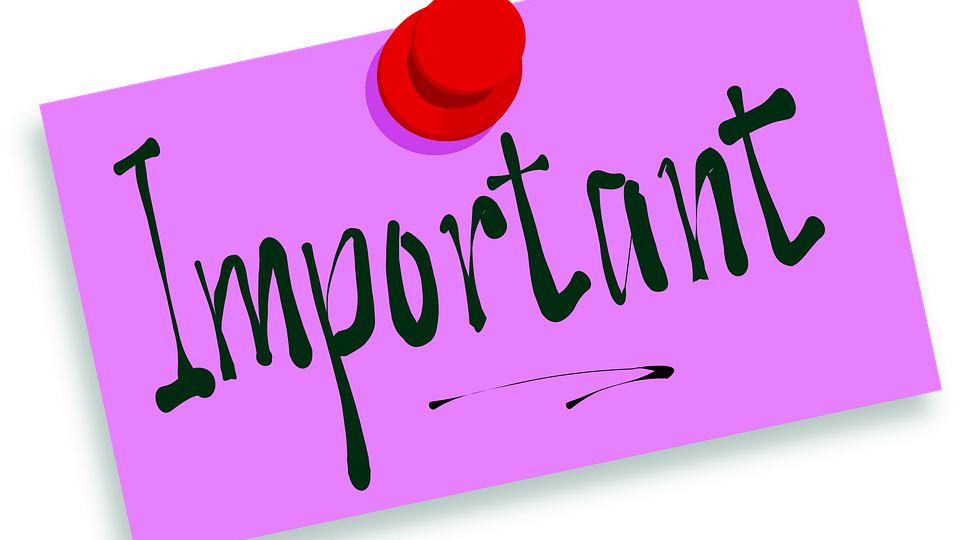Purple post it note with red tack saying Important