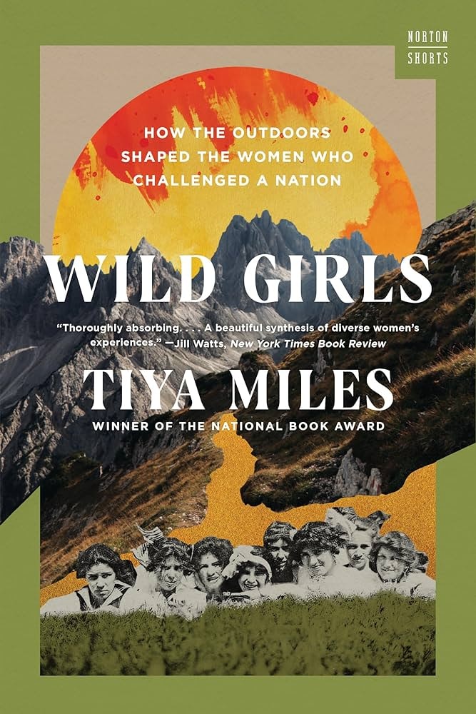 Cover of "Wild Girls" by Tiya Miles, features mountains, women, and a fiery sun. Winner of the National Book Award.