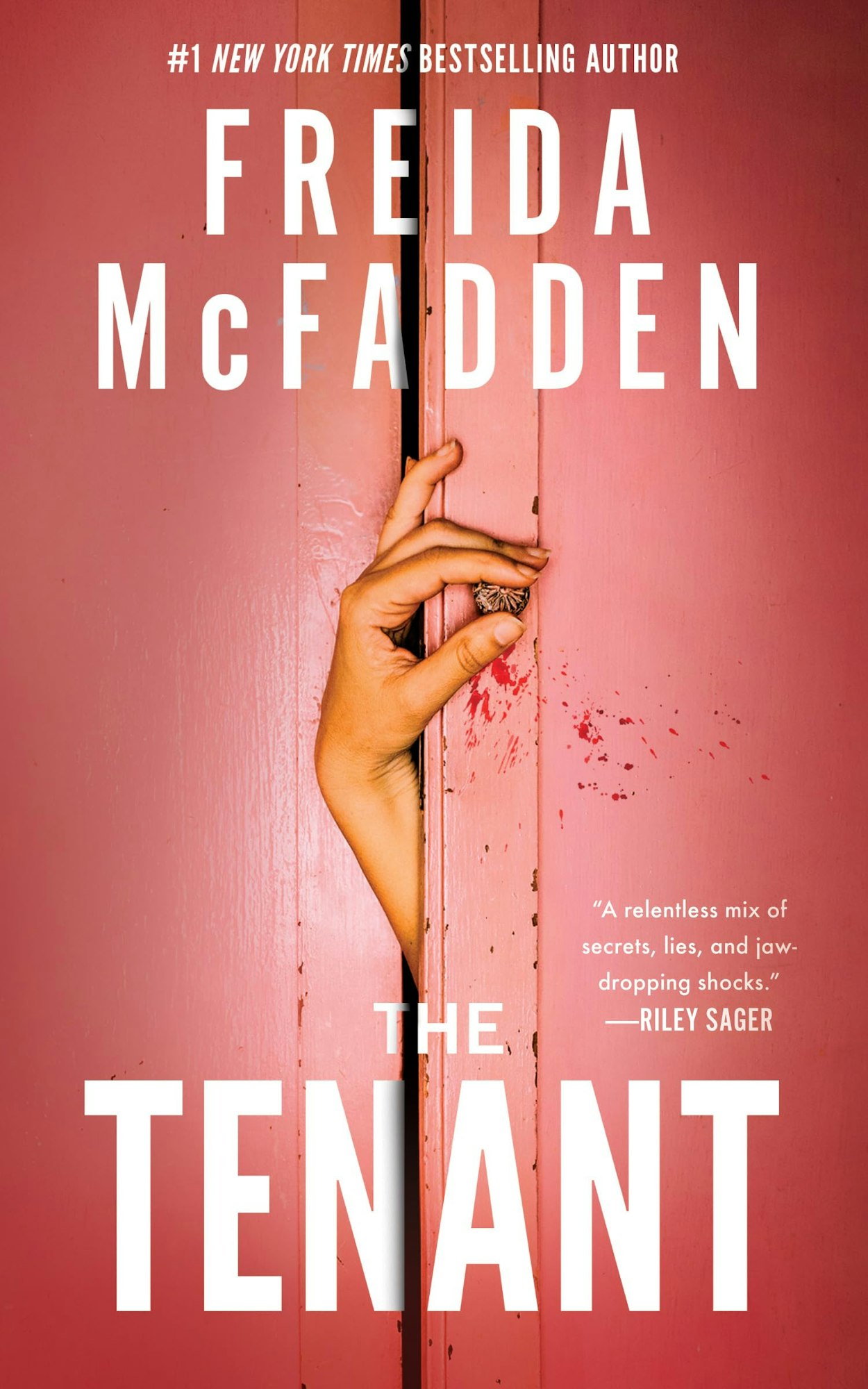 A pink door slightly open with a hand, book cover for "The Tenant" by Freida McFadden.