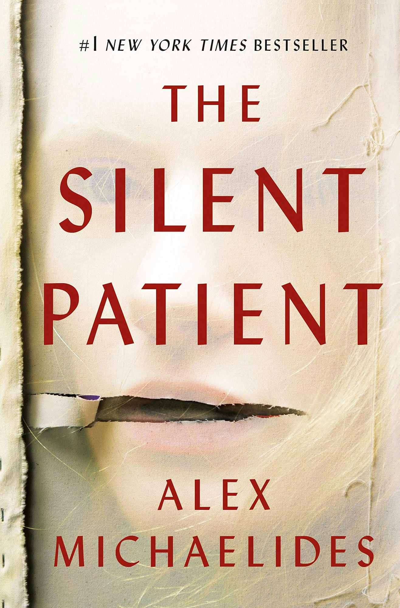 The cover of "The Silent Patient" by Alex Michaelides, featuring a woman's face partially obscured.