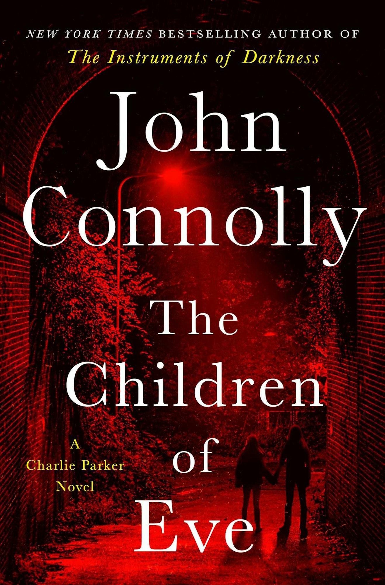 Book cover of "The Children of Eve" by John Connolly, featuring a red-lit tunnel scene and silhouettes.
