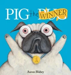 The image features the book "Pig the Winner" by Aaron Blabey, showcasing a humorous pug with a medal, celebrating victory.