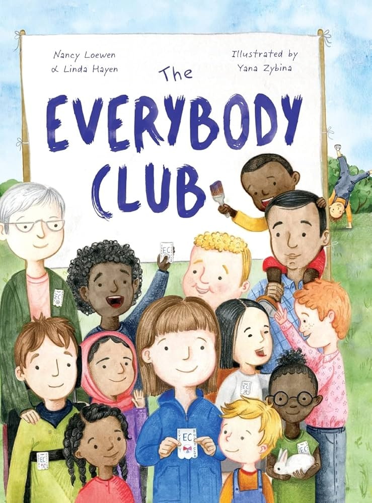 A group of diverse children holding cards with "EC" outside, standing under a sign reading "The Everybody Club."