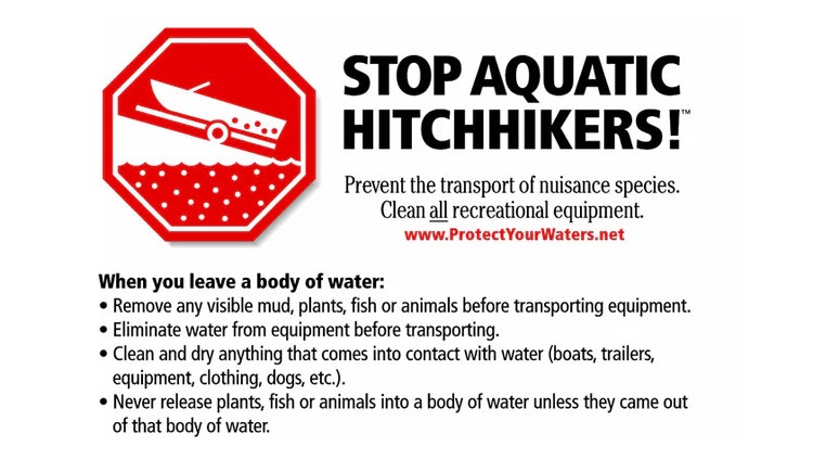 Informational graphic with a red stop sign symbol containing a boat, warning to "STOP AQUATIC HITCHHIKERS!" and encouraging the cleaning of recreational equipment to prevent the spread of invasive species. Includes bulleted steps for cleaning and drying gear after leaving a body of water.