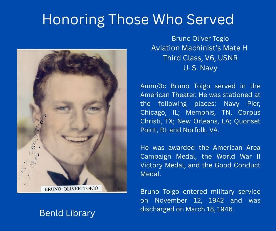 The image honors Bruno Oliver Toigo, a U.S. Navy veteran, detailing his service, stations, and medals earned during WWII.