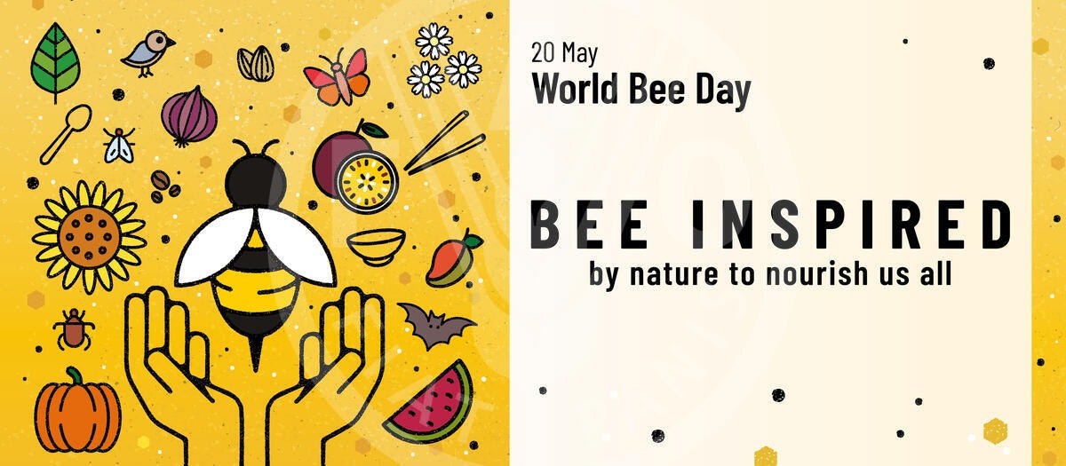 World Bee Day poster with a bee, plants, and "BEE INSPIRED by nature to nourish us all" text on a yellow background.
