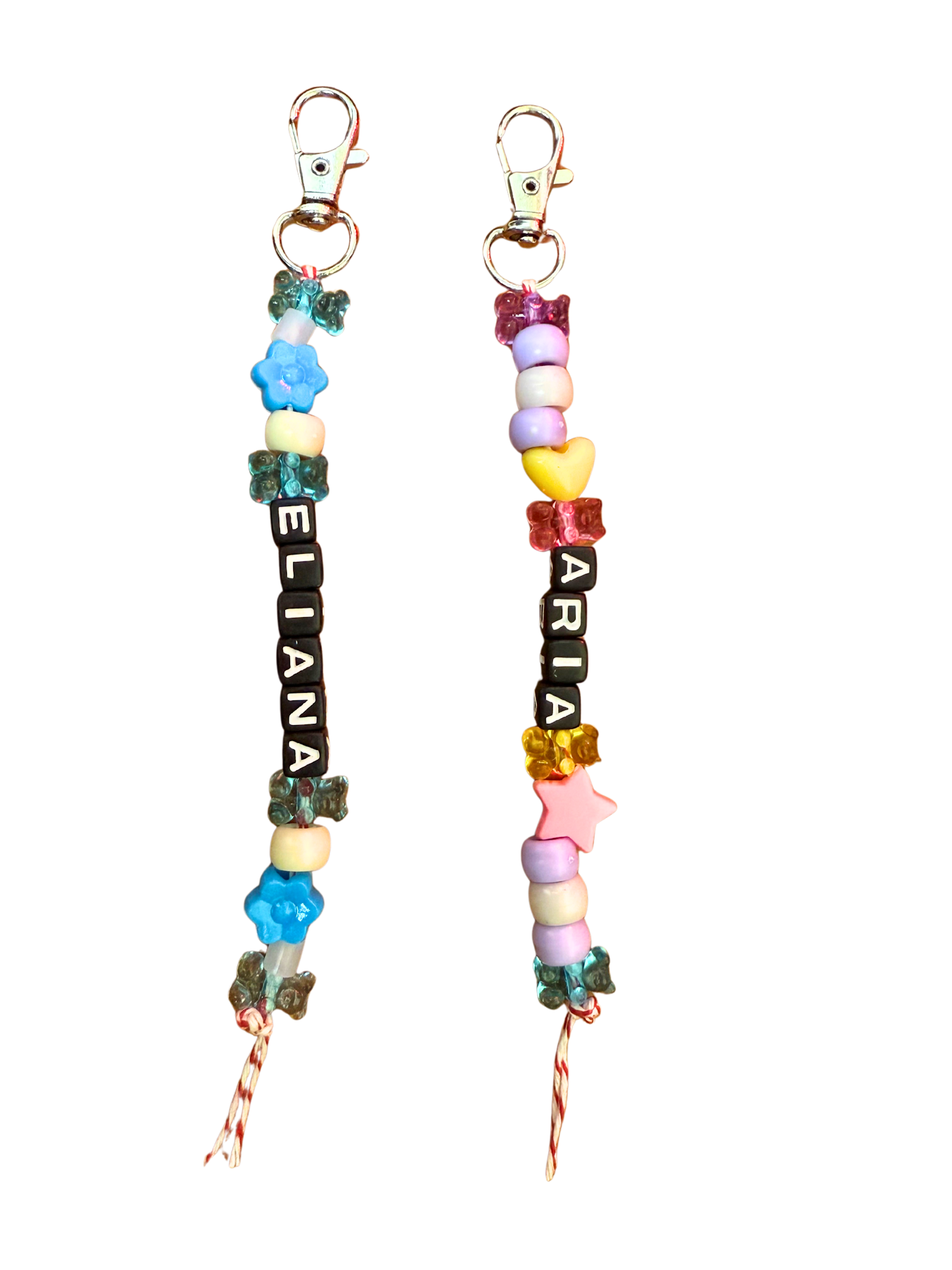 Two colorful beaded keychains with letter beads spelling "ELIANA" and "ARIA."